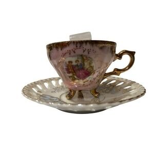 Royal Crown Pink Iridescent Courting Couple Teacup and Reticulated Saucer 55/906